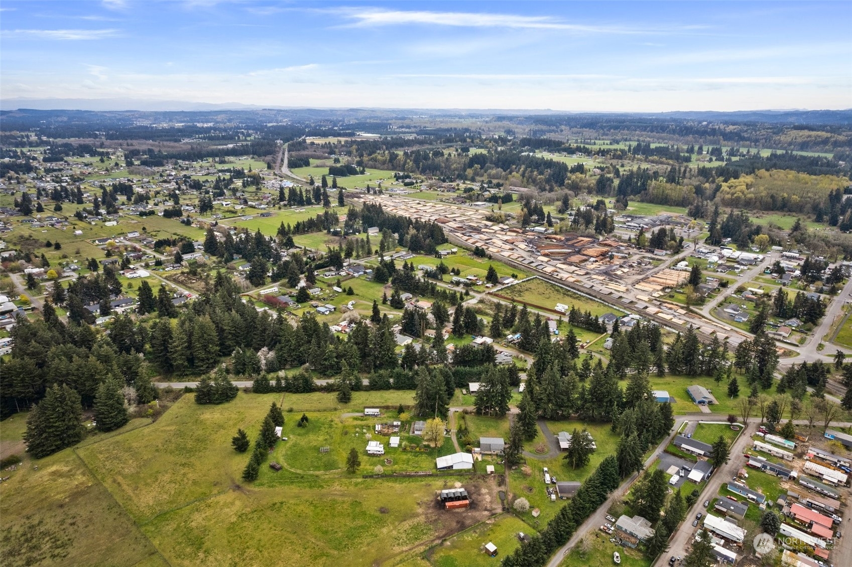 10104 Albany Place Southwest Rochester, WA 98579 - Photo 7 of 31 an aerial view of residential houses with outdoor space