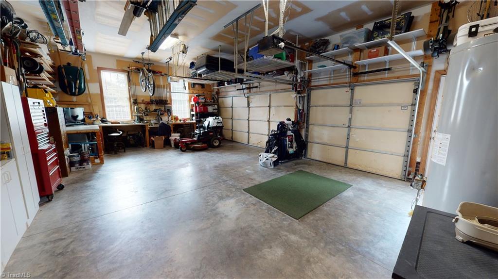 2610 Oxmoor Road Summerfield, NC 27358 - Photo 23 of 31 3 Car Garage with ample tool storage