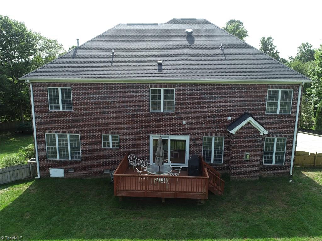 2610 Oxmoor Road Summerfield, NC 27358 - Photo 28 of 31 Deck overlooking back yard