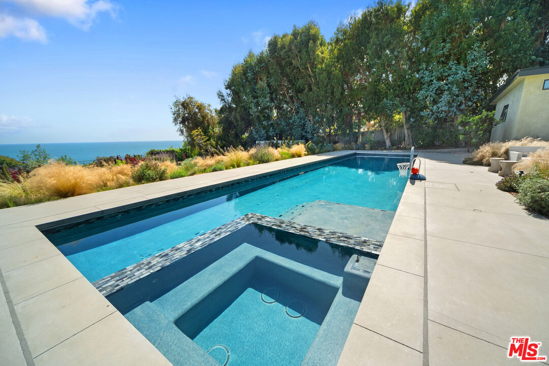 31226 Bailard Road Malibu, CA 90265 - Photo 19 of 40 a view of a backyard with sitting area