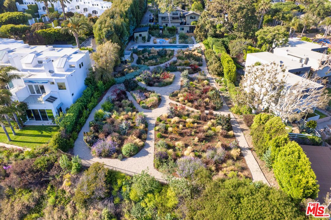 31226 Bailard Road Malibu, CA 90265 - Photo 22 of 40 a view of a city with flower plants and large trees