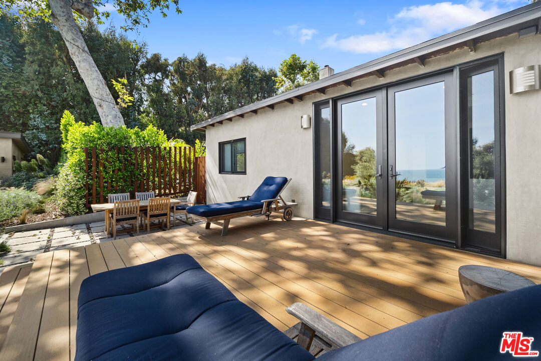 31226 Bailard Road Malibu, CA 90265 - Photo 35 of 40 a view of backyard with outdoor seating and plants