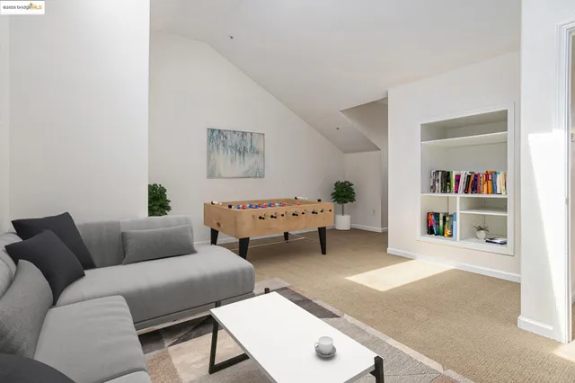 a living room with furniture and a couch