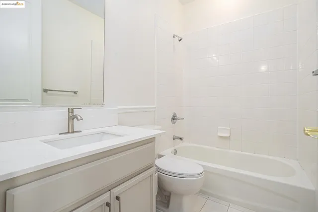 a bathroom with a sink a toilet and a bathtub