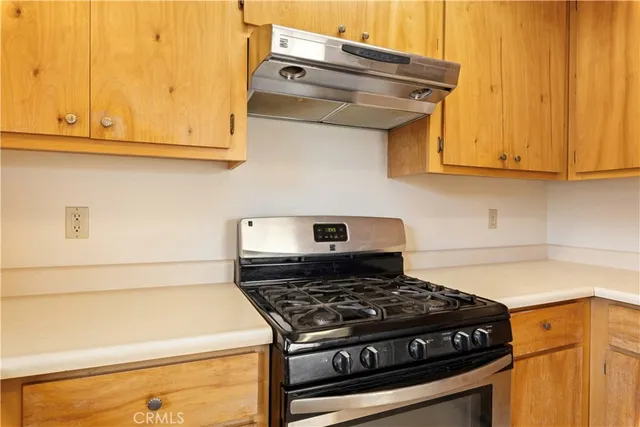 a bathroom with a shower and a glass door