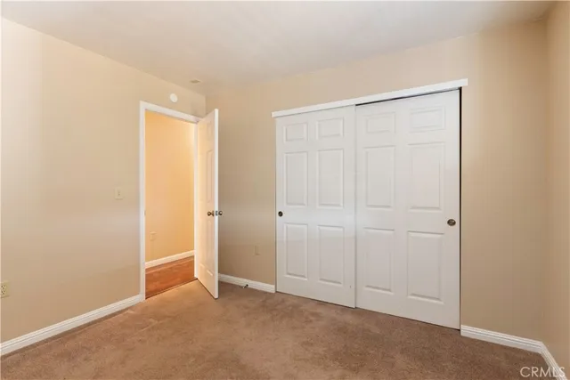 a view of a room with a large window