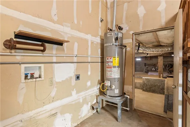 a view of a deck with chairs and wooden fence