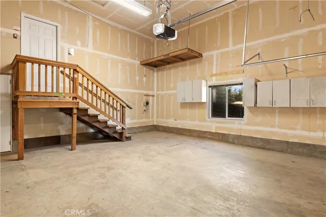 a roof deck with a table and chairs