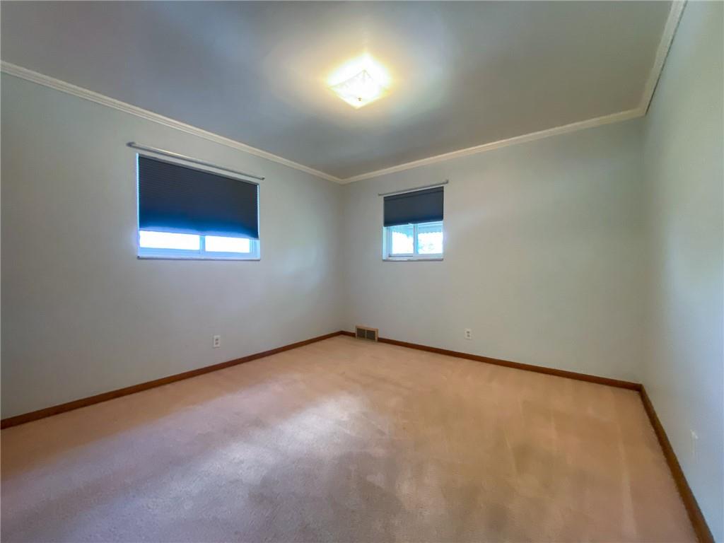 128 Clover Drive Monaca, PA 15061 - Photo 10 of 19 an empty room with a window