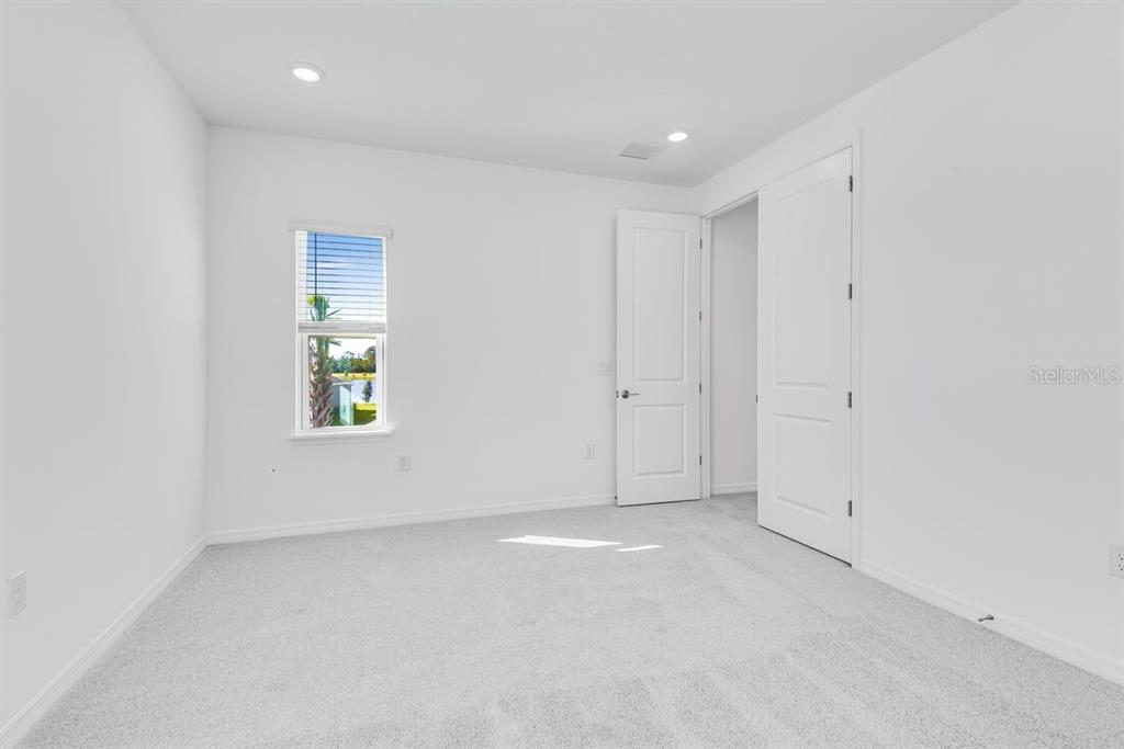 581 Moon Shell Circle New Smyrna Beach, FL 32168 - Photo 19 of 40 a view of an empty room