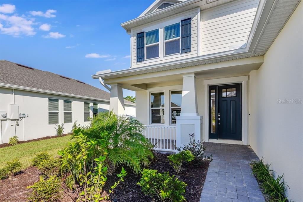 581 Moon Shell Circle New Smyrna Beach, FL 32168 - Photo 2 of 40 a view of a house with potted plants
