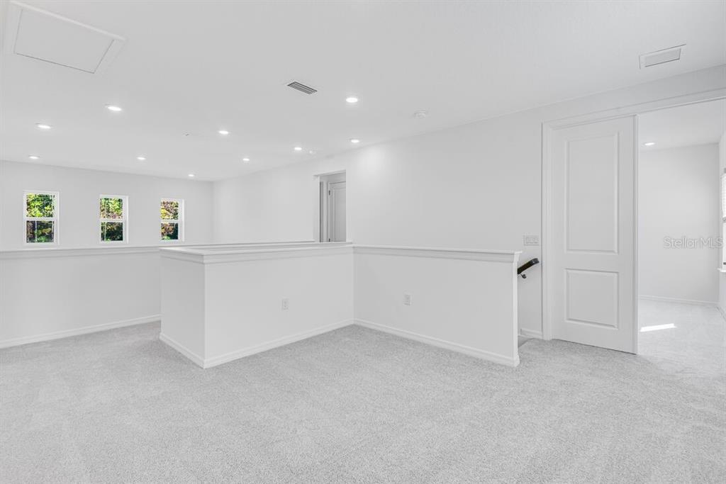 581 Moon Shell Circle New Smyrna Beach, FL 32168 - Photo 29 of 40 a view of an empty room