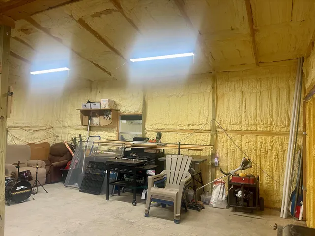 a view of a workspace with furniture