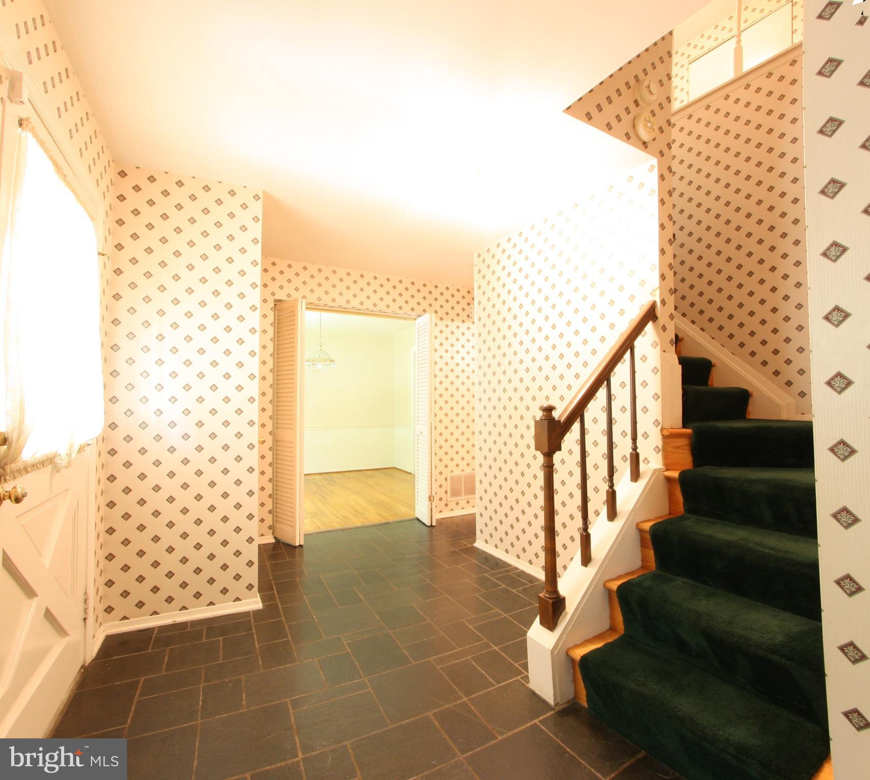 2425 Countryside Drive Silver Spring, MD 20905 - Photo 2 of 24 a view of entryway with staircase