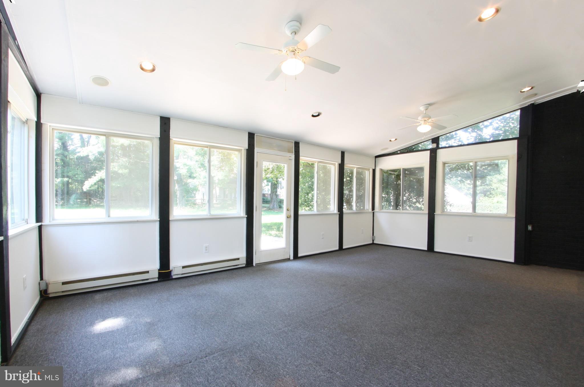 2425 Countryside Drive Silver Spring, MD 20905 - Photo 13 of 24 a view of an empty room with a window