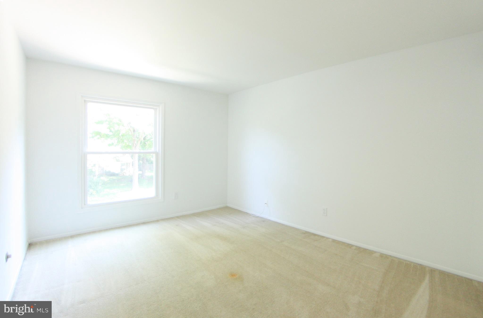 2425 Countryside Drive Silver Spring, MD 20905 - Photo 14 of 24 an empty room with a window