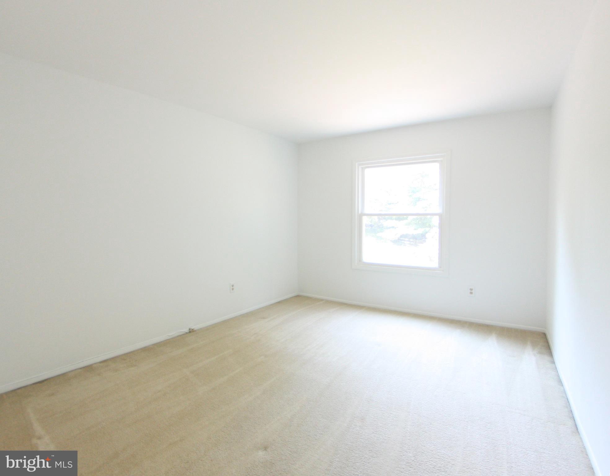 2425 Countryside Drive Silver Spring, MD 20905 - Photo 15 of 24 an empty room with a window