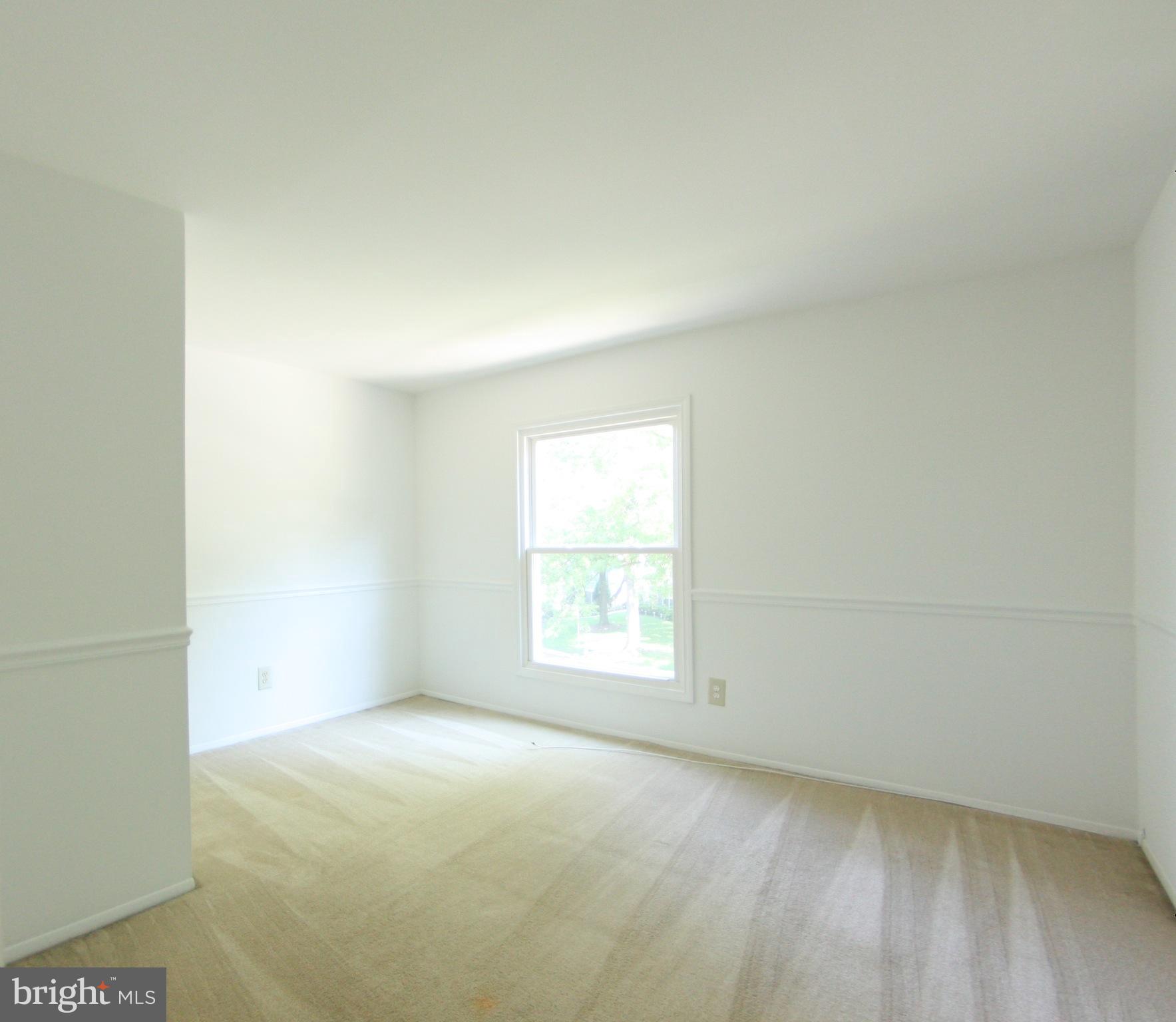 2425 Countryside Drive Silver Spring, MD 20905 - Photo 16 of 24 an empty room with a window