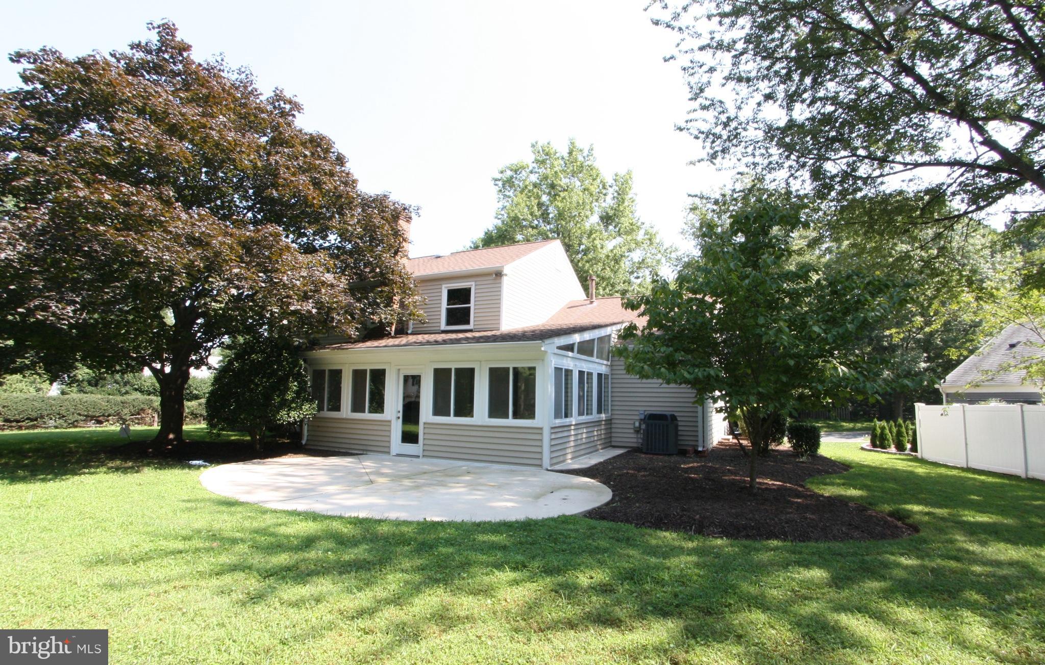 2425 Countryside Drive Silver Spring, MD 20905 - Photo 22 of 24 a front view of a house with a yard