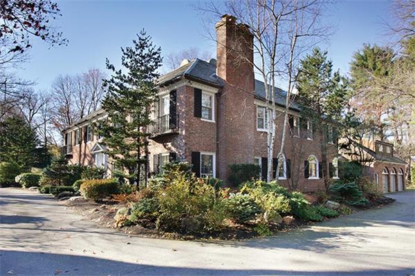 145 Lee Street Brookline, MA 02445 - Photo 11 of 12 a front view of a house with a garden