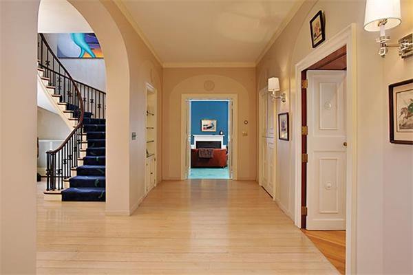 145 Lee Street Brookline, MA 02445 - Photo 3 of 12 a view of a hallway with wooden floor and entryway