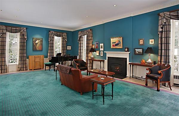 145 Lee Street Brookline, MA 02445 - Photo 4 of 12 a living room with furniture and a fireplace