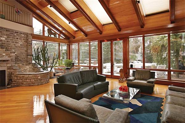 145 Lee Street Brookline, MA 02445 - Photo 9 of 12 a living room with furniture and floor to ceiling windows