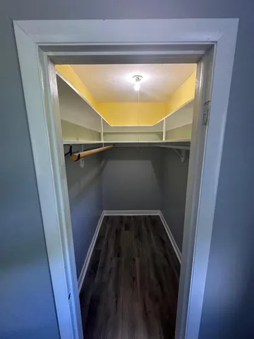 a view of a living room and bathroom