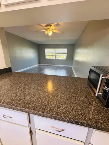 a view of swimming pool from a lake view