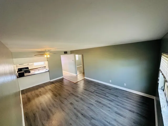 a view of a kitchen with a sink