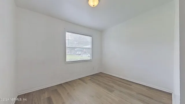 an empty room with a window