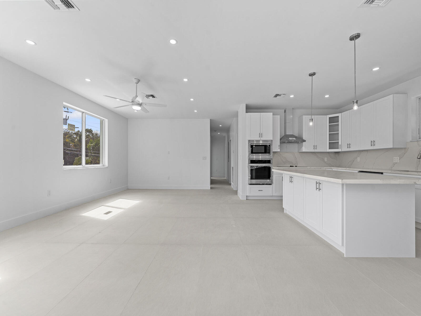 101 Kay Drive Key Largo, FL 33037 - Photo 17 of 71 a view of kitchen with kitchen island a sink stainless steel appliances and cabinets