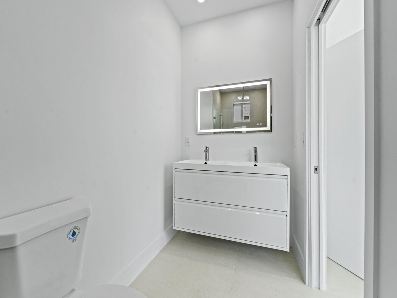 101 Kay Drive Key Largo, FL 33037 - Photo 38 of 71 a bathroom with a sink a mirror and vanity