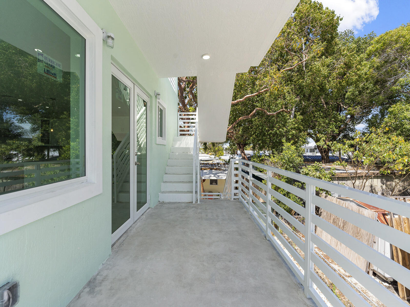 101 Kay Drive Key Largo, FL 33037 - Photo 41 of 71 a view of an outdoor space and deck