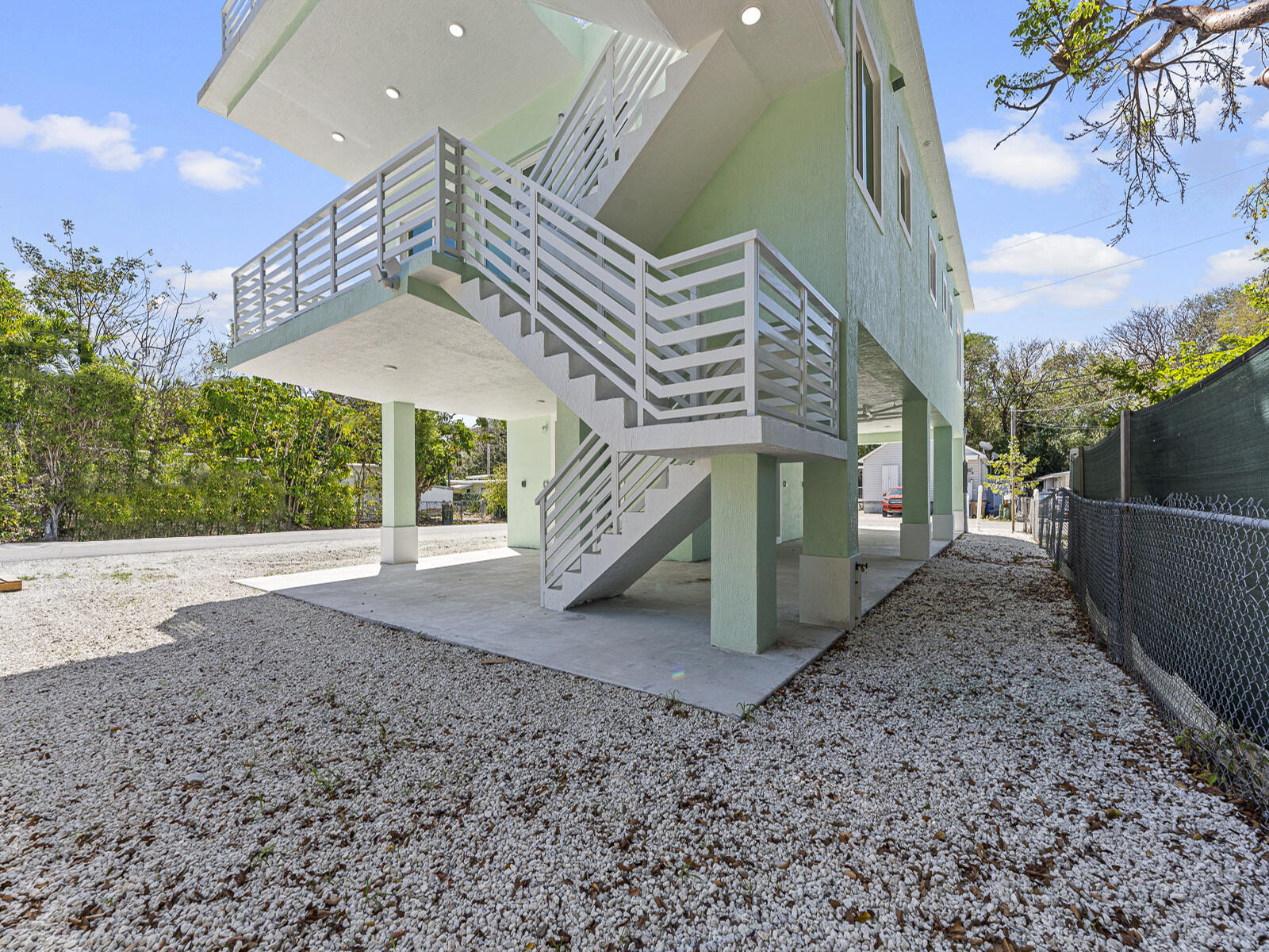 101 Kay Drive Key Largo, FL 33037 - Photo 54 of 71 a view of a house with a yard
