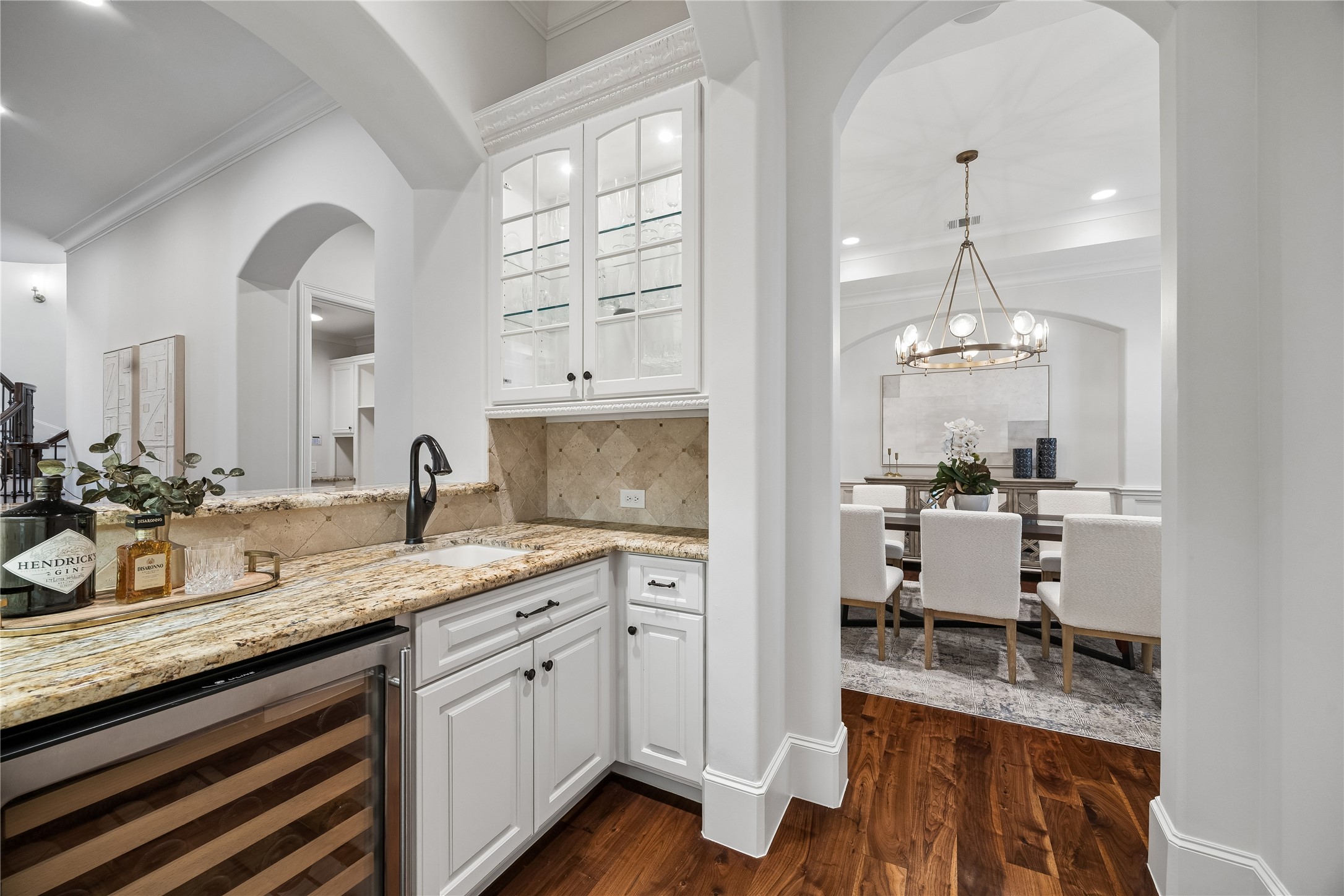 4511 Merrie Lane Bellaire, TX 77401 - Photo 14 of 46 Convenient wet bar with wine cooler enhances flow between the kitchen and dining areas