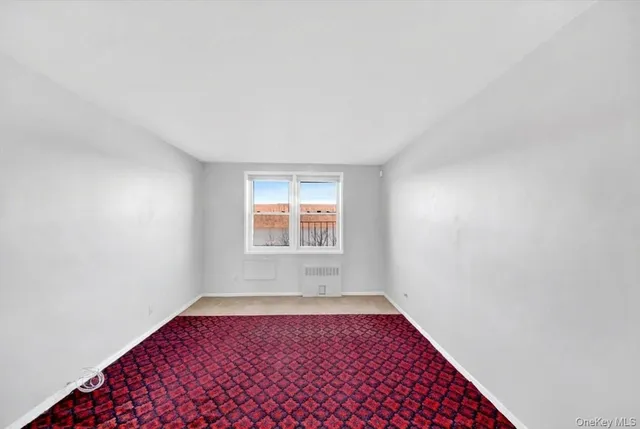 an empty room with window