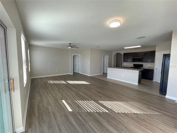 a view of a kitchen from the hallway