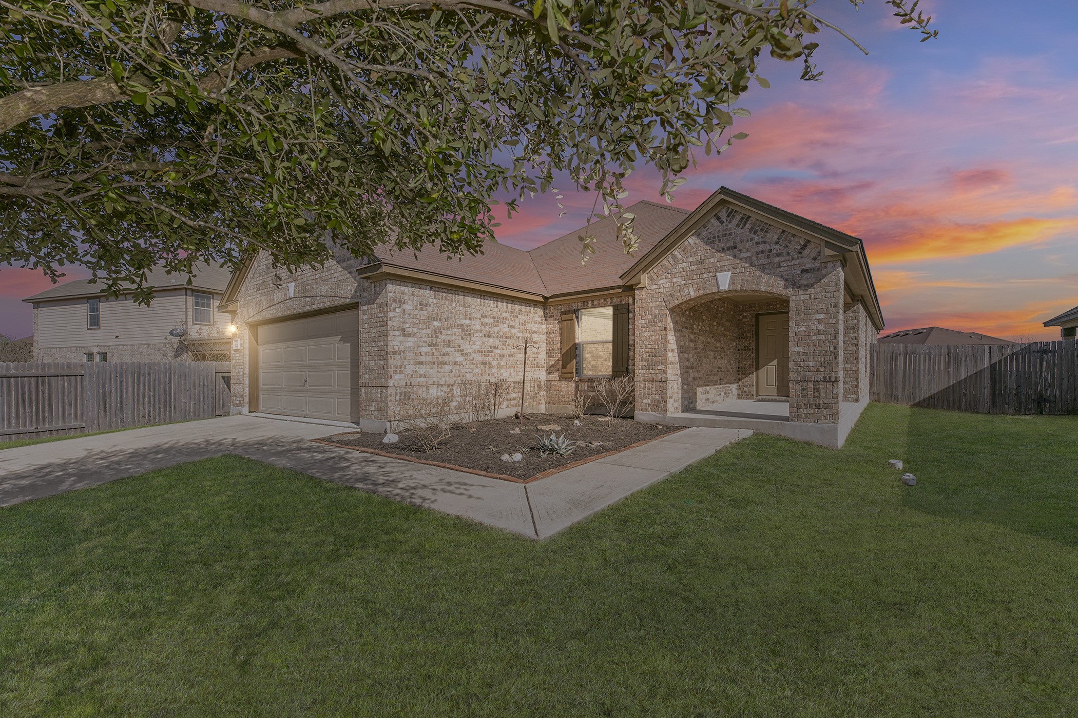1141 Renaissance Trail Round Rock, TX 78665 - Photo 19 of 23 A classic brick facade welcomes you home, complemented by a pristine lawn and a private driveway.
