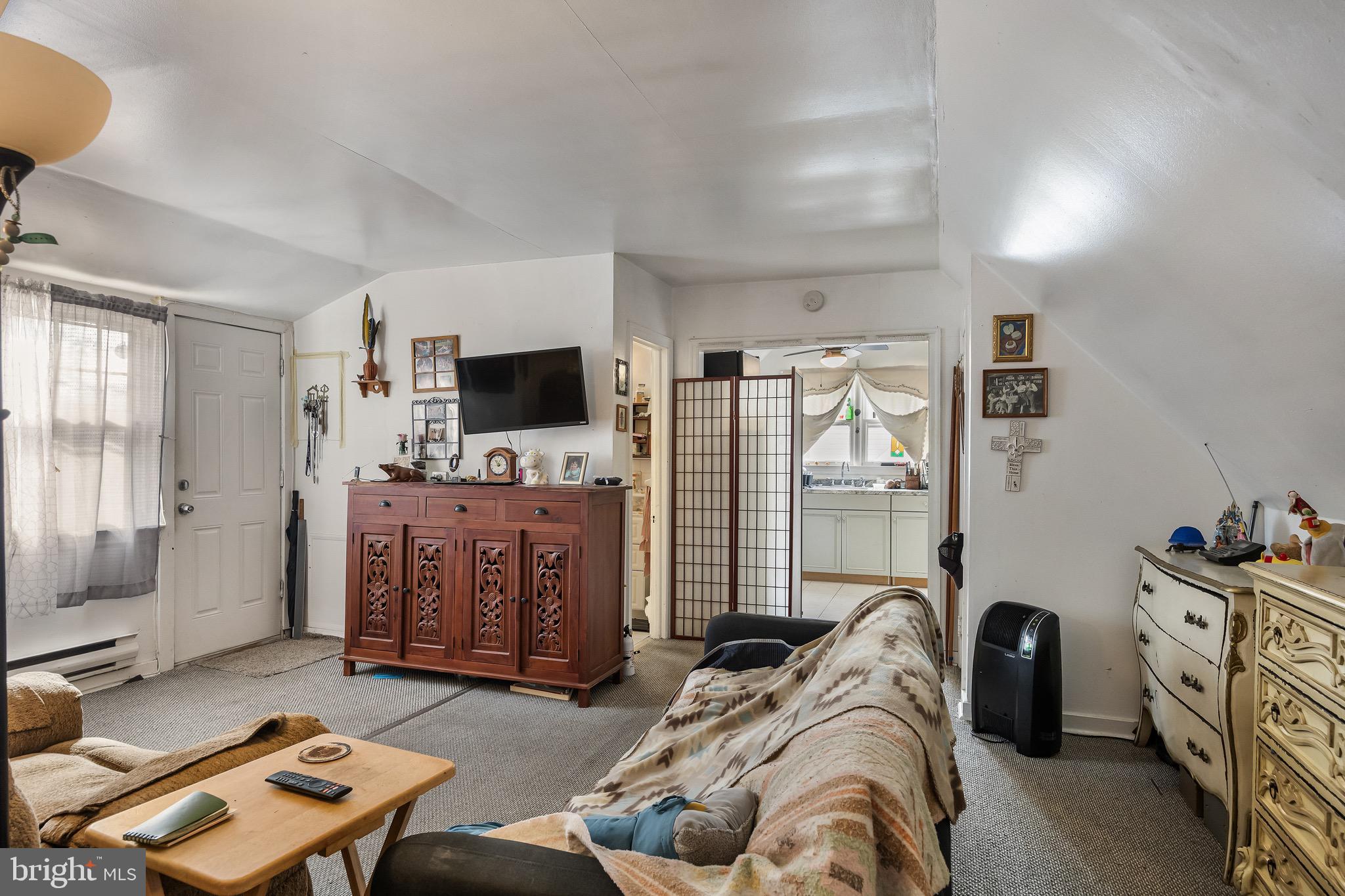 303 Pine Street Carneys Point, NJ 08069 - Photo 15 of 34 a bedroom with furniture and a flat screen tv