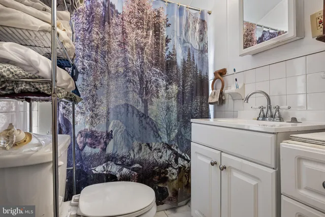 a kitchen with sink cabinets and stove