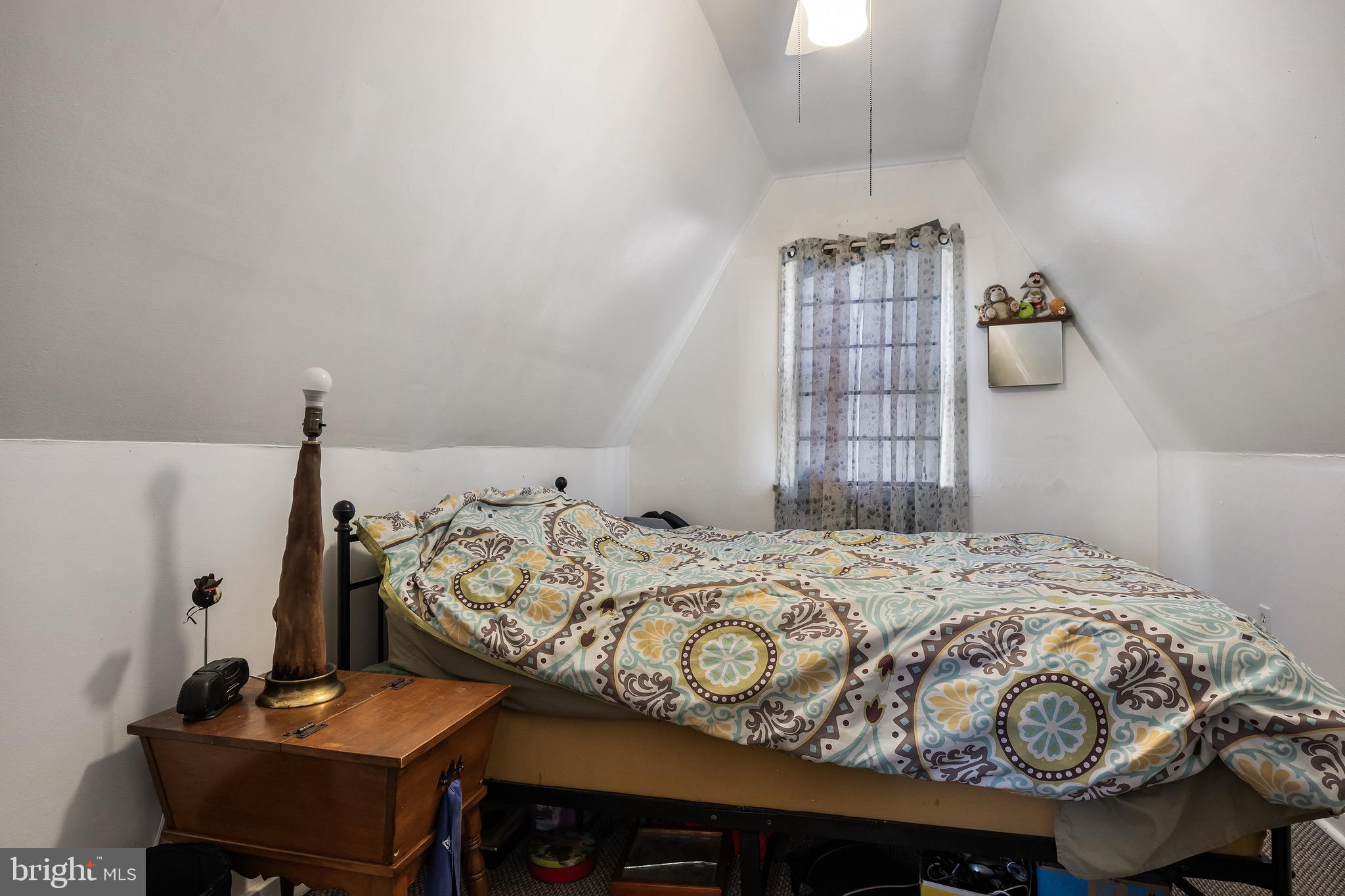 303 Pine Street Carneys Point, NJ 08069 - Photo 19 of 34 a bedroom with a bed and dresser