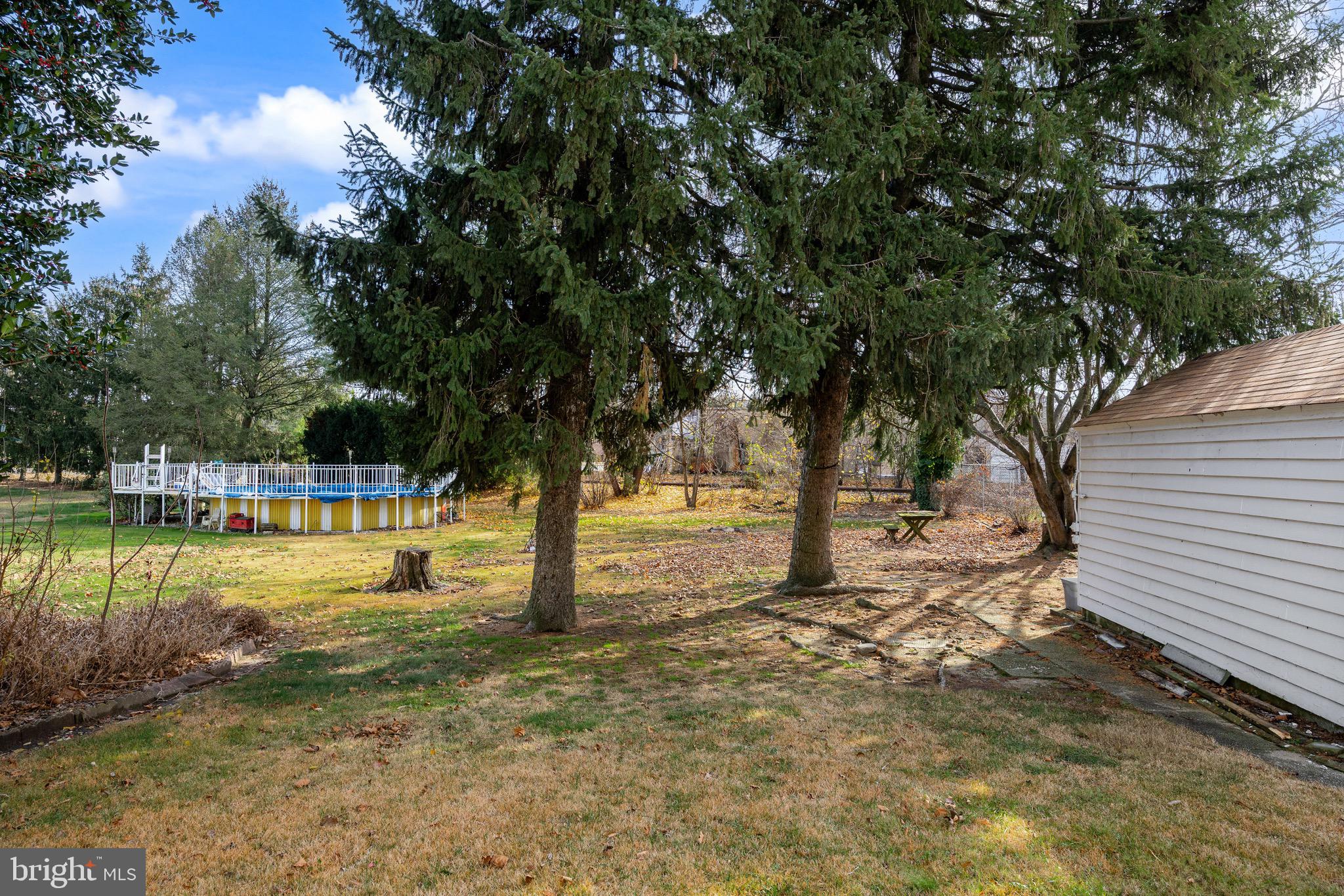 303 Pine Street Carneys Point, NJ 08069 - Photo 25 of 34 a view of a yard with swimming pool