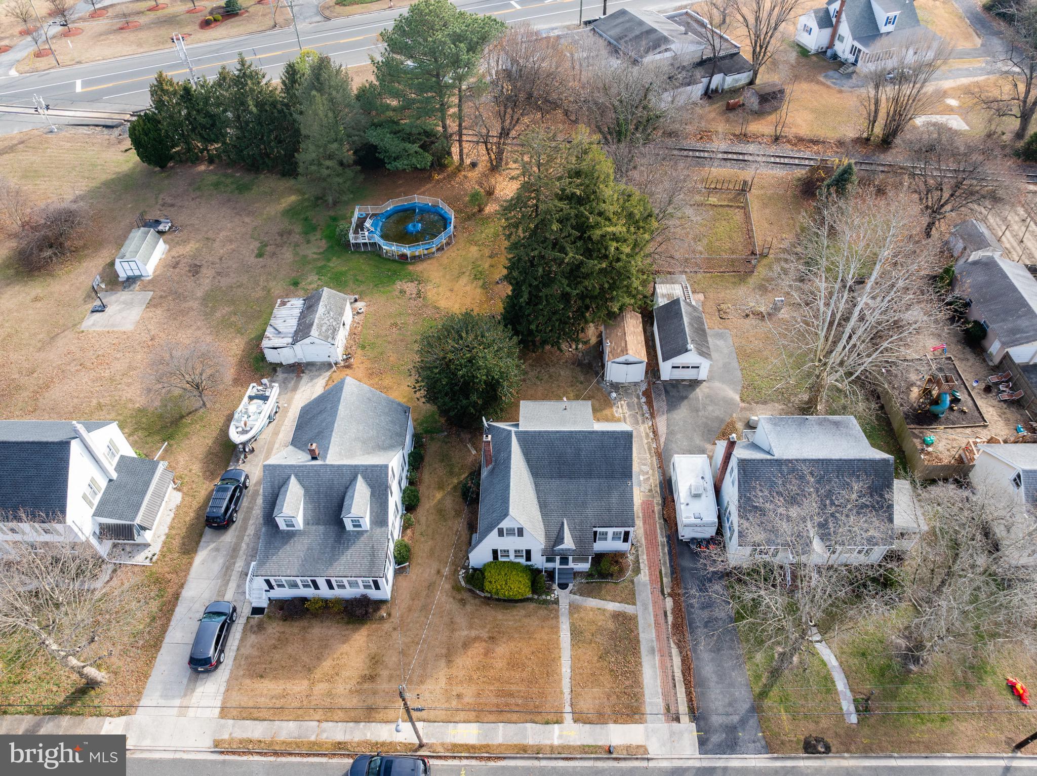 303 Pine Street Carneys Point, NJ 08069 - Photo 29 of 34 an aerial view of a house with garden space and street view