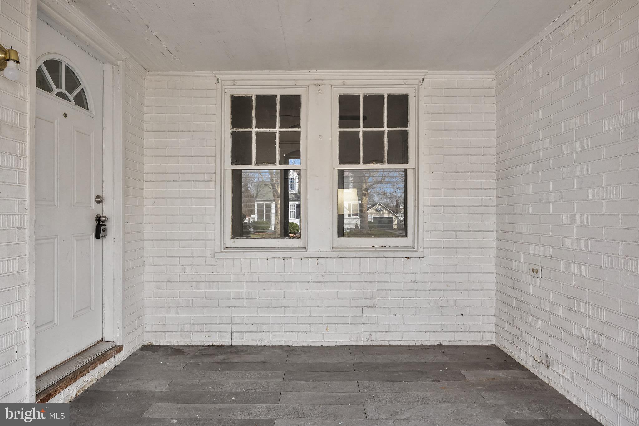303 Pine Street Carneys Point, NJ 08069 - Photo 4 of 34 an empty room with windows