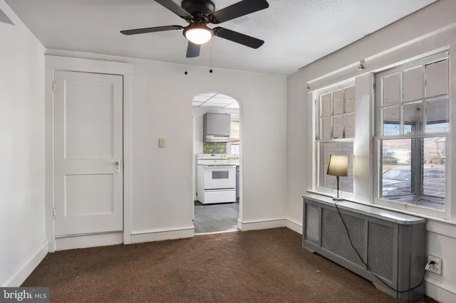 a kitchen with granite countertop a sink and a window