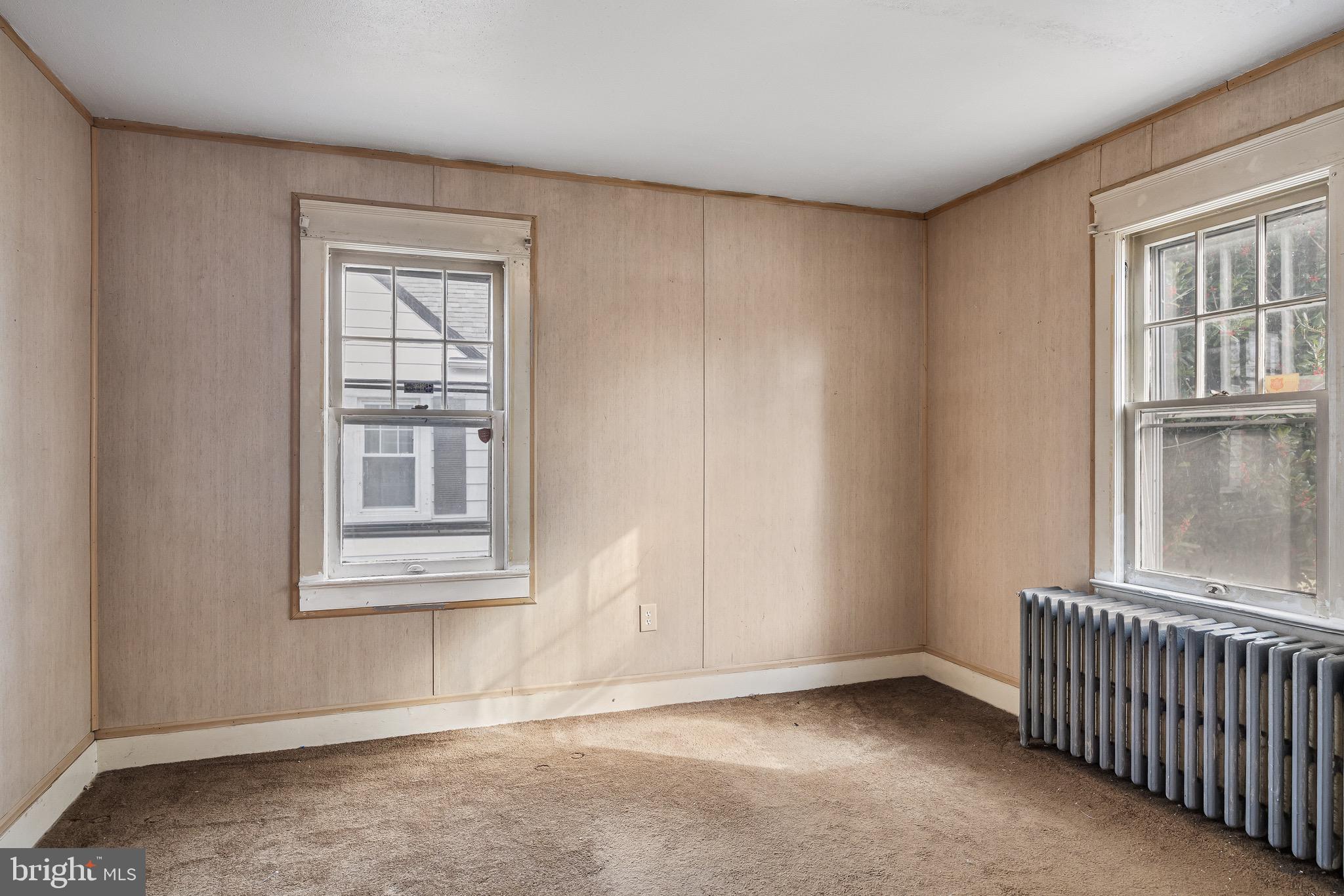 303 Pine Street Carneys Point, NJ 08069 - Photo 10 of 34 an empty room with windows