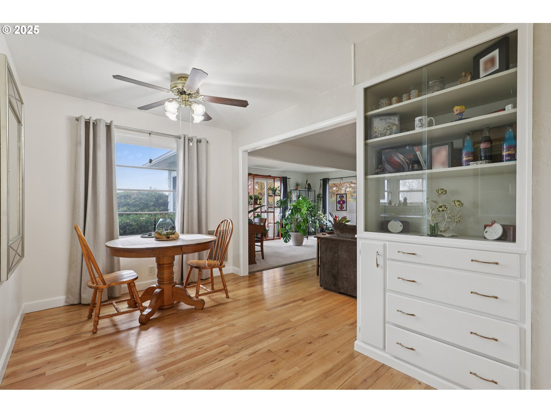 4535 Southwest Golf Course Road Cornelius, OR 97113 - Photo 12 of 43 a view of a workspace with furniture and a window