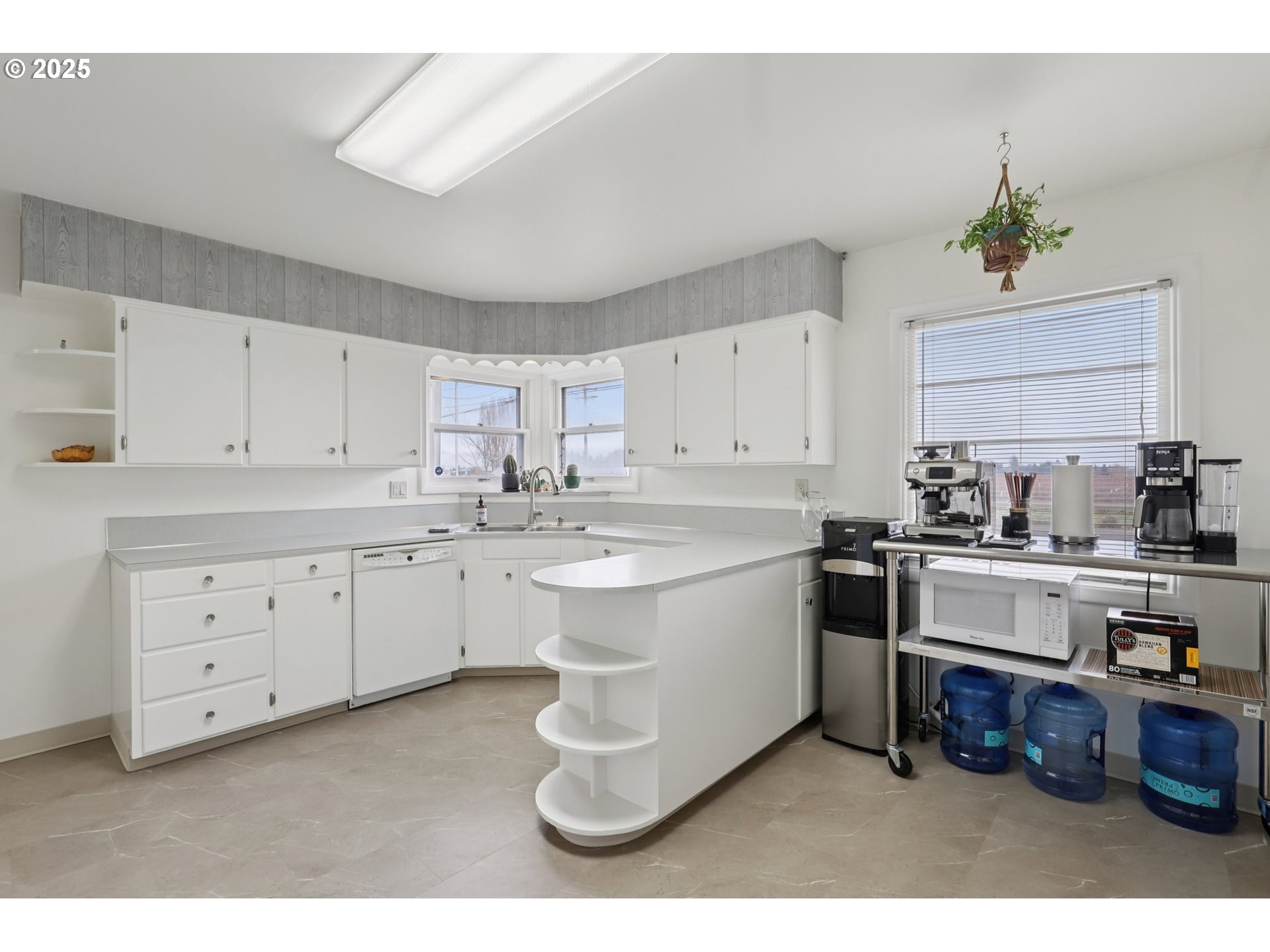 4535 Southwest Golf Course Road Cornelius, OR 97113 - Photo 15 of 43 a kitchen with cabinets a sink and white stainless steel appliances