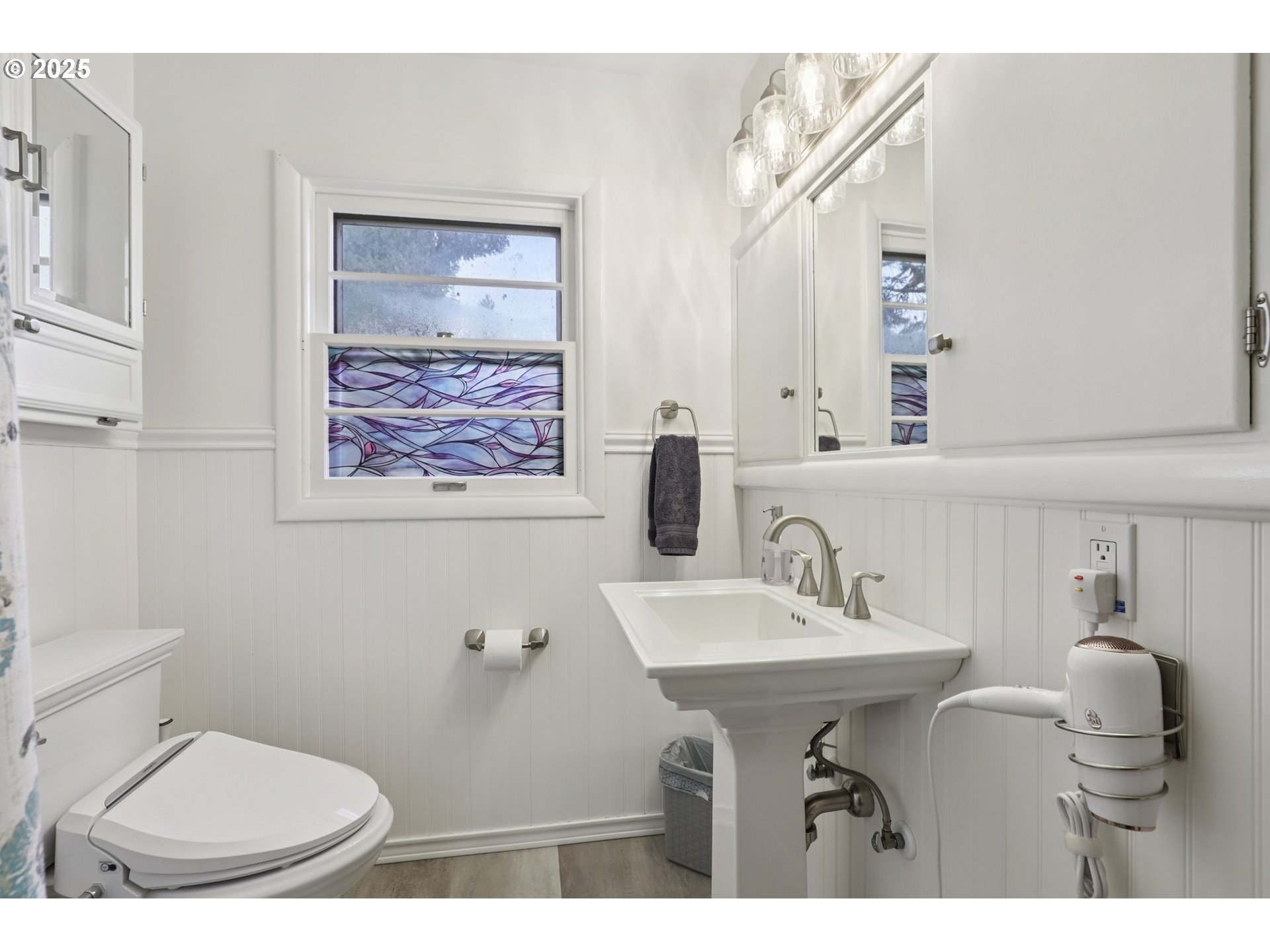 4535 Southwest Golf Course Road Cornelius, OR 97113 - Photo 23 of 43 a bathroom with a toilet sink and mirror